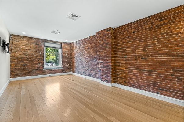 Empty room, Interior, Recessed Lighting, Stone Walls, Wood Texture Flooring