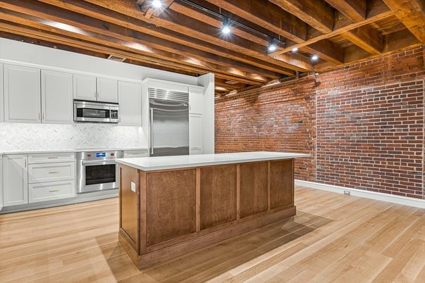 Interior, Kitchen, Stainless Steel Appliances, Stone Walls, Wooden Beams, Wood Texture Flooring