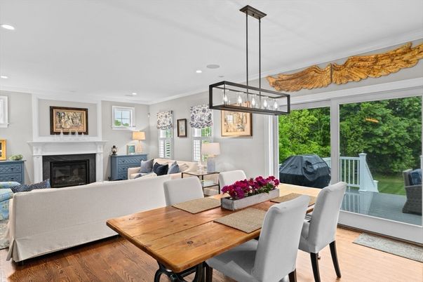 Dining room, Fireplace, Interior, Living room, Pendant Lights, Recessed Lighting, Wood Texture Flooring