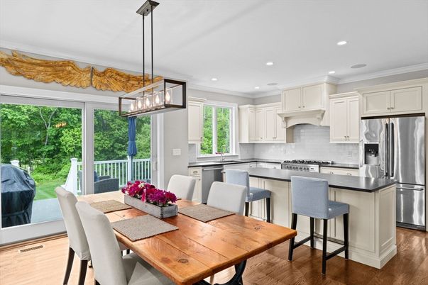 Dining room, Interior, Kitchen, Pendant Lights, Recessed Lighting, Stainless Steel Appliances, Wood Texture Flooring