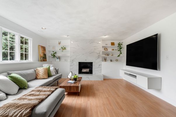 Fireplace, Interior, Living room, Marble Walls, Recessed Lighting, Wood Texture Flooring