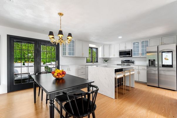 Chandelier, Dining room, Interior, Kitchen, Recessed Lighting, Stainless Steel Appliances, Wood Texture Flooring
