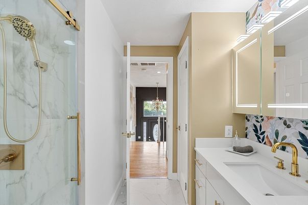 Bathroom, Chandelier, Dual Sink Vanities, Interior, Marble, Marble Walls