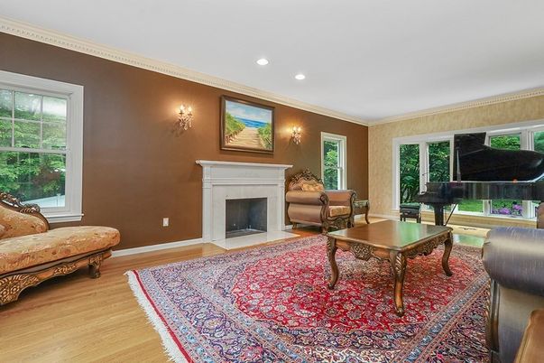 Fireplace, Interior, Living room, Piano, Recessed Lighting, Wood Texture Flooring