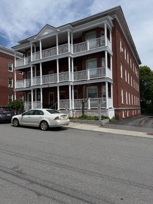 Exterior, Facade, Brick Facade, Condo Building