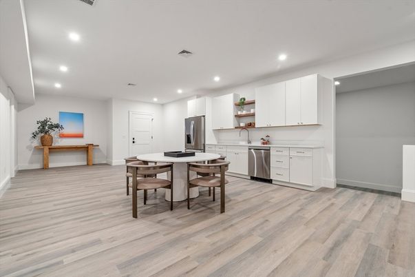 Dining room, Interior, Kitchen, Recessed Lighting, Stainless Steel Appliances, Wood Texture Flooring