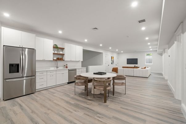 Dining room, Interior, Kitchen, Living room, Recessed Lighting, Stainless Steel Appliances, Wood Texture Flooring