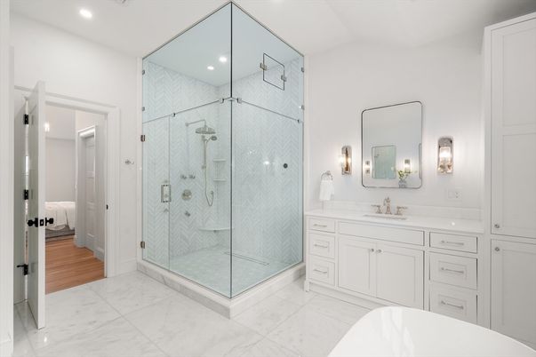 Bathroom, Dual Sink Vanities, Glass Shower, Interior, Marble, Marble Walls, Recessed Lighting, Wood Texture Flooring
