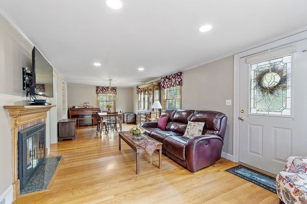 Dining room, Fireplace, Interior, Living room, Recessed Lighting, Wood Texture Flooring