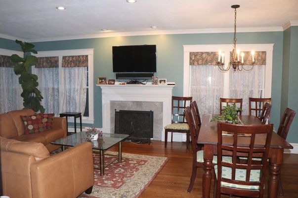 Chandelier, Dining room, Fireplace, Interior, Living room, Recessed Lighting, Wood Texture Flooring