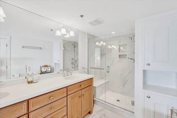 Bathroom, Dual Sink Vanities, Glass Shower, Interior, Marble, Marble Walls, Recessed Lighting