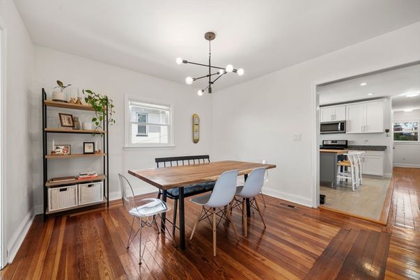 Dining room, Interior, Kitchen, Pendant Lights, Recessed Lighting, Stainless Steel Appliances, Wood Texture Flooring