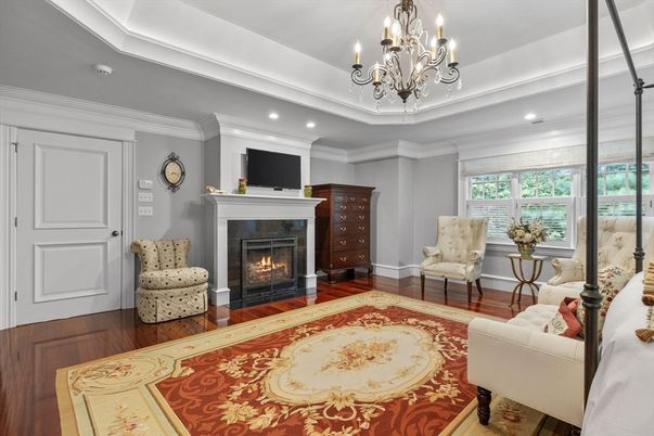 Chandelier, Fireplace, Interior, Living room, Recessed Lighting, Wood Texture Flooring