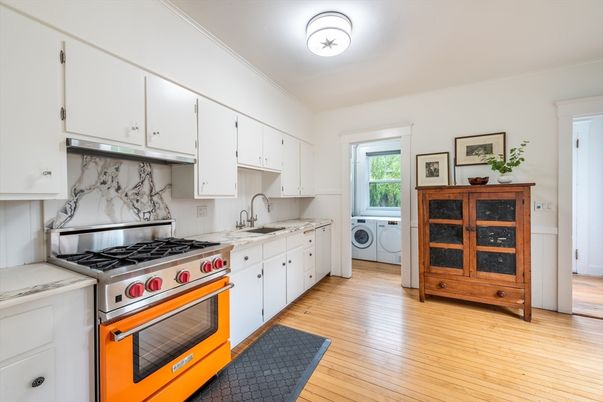 Interior, Kitchen, Marble Walls, Washer, Wood Texture Flooring