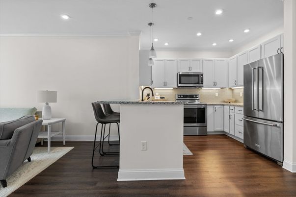 Interior, Kitchen, Pendant Lights, Recessed Lighting, Stainless Steel Appliances, Wood Texture Flooring