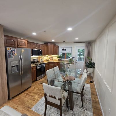 Dining room, Interior, Kitchen, Pendant Lights, Recessed Lighting, Stainless Steel Appliances, Wood Texture Flooring