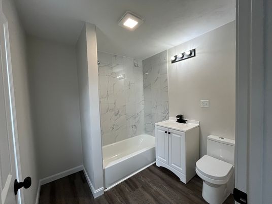 Bathroom, Interior, Marble Walls, Recessed Lighting, Wood Texture Flooring