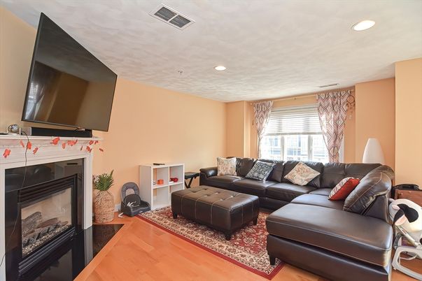 Fireplace, Interior, Living room, Recessed Lighting, Wood Texture Flooring