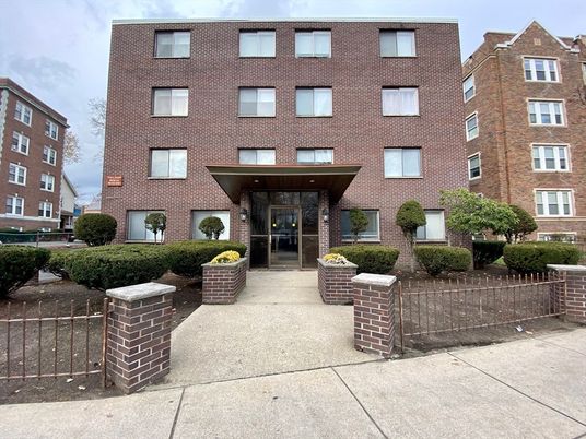 Exterior, Facade, Brick Facade, Condo Building
