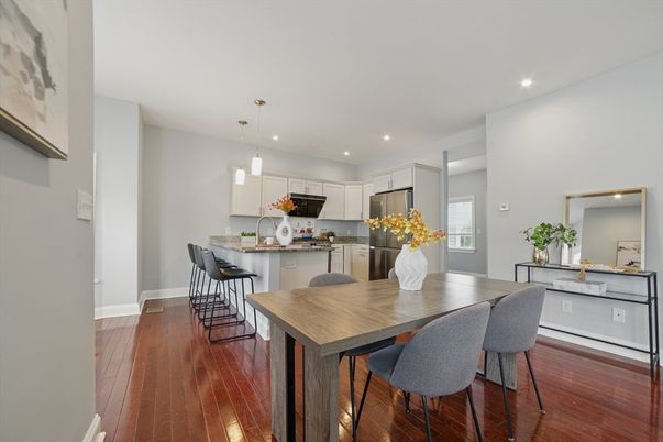 Dining room, Interior, Kitchen, Pendant Lights, Recessed Lighting, Stainless Steel Appliances, Wood Texture Flooring