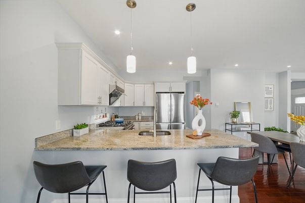 Dining room, Interior, Kitchen, Pendant Lights, Recessed Lighting, Stainless Steel Appliances, Wood Texture Flooring