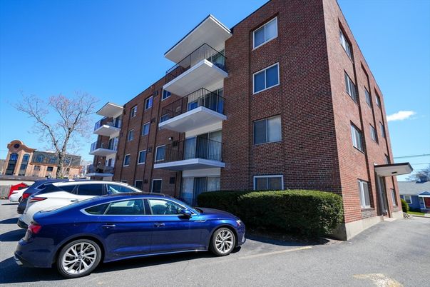 Exterior, Facade, Brick Facade, Condo Building