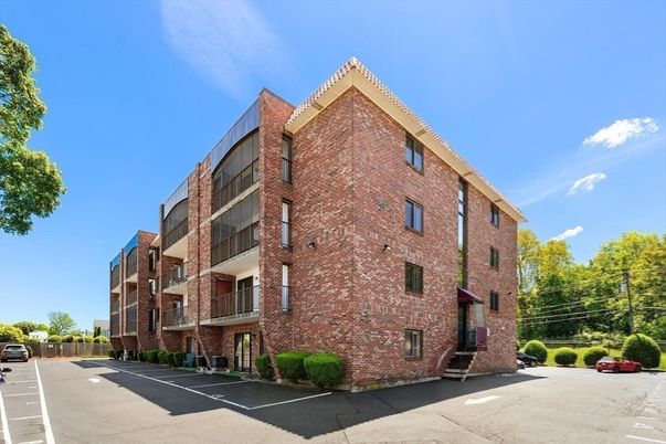 Exterior, Facade, Brick Facade, Condo Building