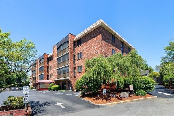 Exterior, Facade, Brick Facade, Condo Building