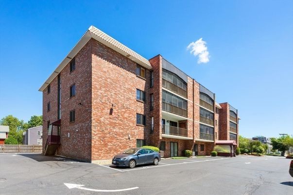 Exterior, Facade, Brick Facade, Condo Building