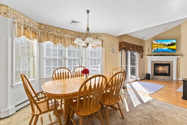 Dining room, Fireplace, Interior, Pendant Lights, Wood Texture Flooring