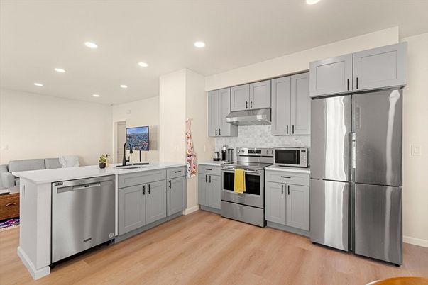 Interior, Kitchen, Recessed Lighting, Stainless Steel Appliances, Wood Texture Flooring