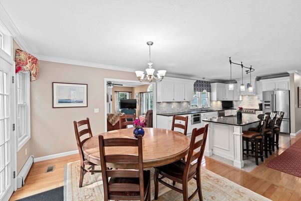 Chandelier, Dining room, Interior, Kitchen, Pendant Lights, Stainless Steel Appliances, Wood Texture Flooring