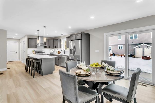 Dining room, Interior, Kitchen, Pendant Lights, Recessed Lighting, Stainless Steel Appliances, Wood Texture Flooring
