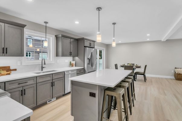 Dining room, Interior, Kitchen, Pendant Lights, Recessed Lighting, Stainless Steel Appliances, Wood Texture Flooring