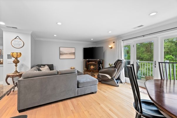 Dining room, Fireplace, Interior, Living room, Recessed Lighting, Wood Texture Flooring