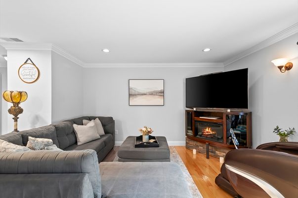 Fireplace, Interior, Living room, Recessed Lighting, Wood Texture Flooring