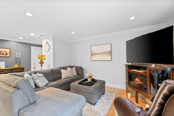 Fireplace, Interior, Living room, Recessed Lighting, Wood Texture Flooring