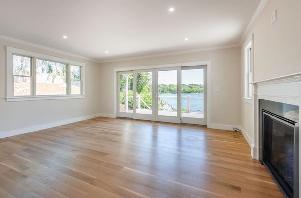 Empty room, Fireplace, Interior, Recessed Lighting, Water, Wood Texture Flooring