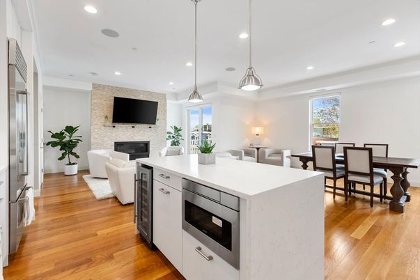 Dining room, Fireplace, Interior, Kitchen, Living room, Pendant Lights, Recessed Lighting, Stainless Steel Appliances, Stone Walls, Wood Texture Flooring