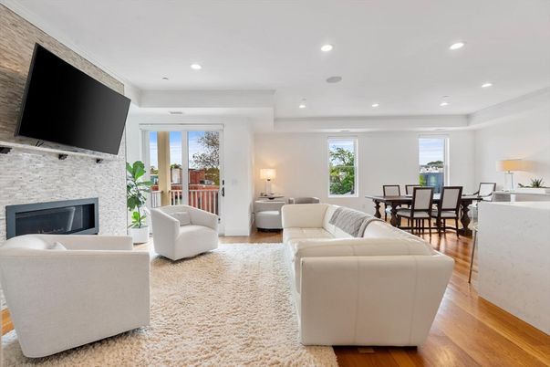 Dining room, Fireplace, Interior, Living room, Recessed Lighting, Wood Texture Flooring