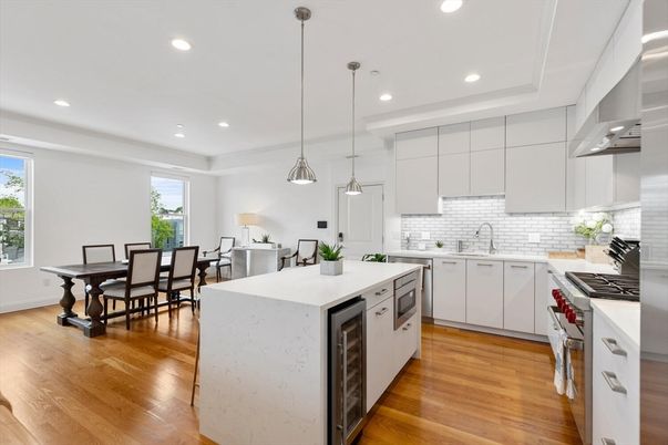 Dining room, Interior, Kitchen, Pendant Lights, Recessed Lighting, Stainless Steel Appliances, Wood Texture Flooring