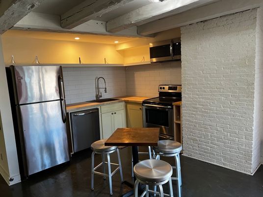 Interior, Kitchen, Recessed Lighting, Stainless Steel Appliances, Stone Walls