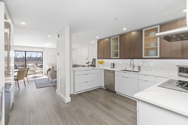 Interior, Kitchen, Marble Walls, Recessed Lighting, Stainless Steel Appliances, Wood Texture Flooring