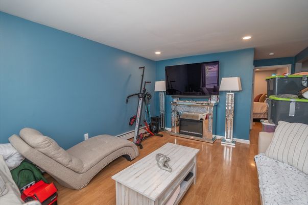 Fireplace, Interior, Living room, Recessed Lighting, Wood Texture Flooring