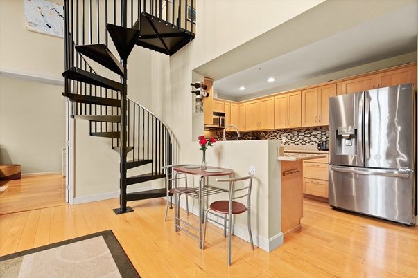 Dining room, Interior, Kitchen, Recessed Lighting, Stainless Steel Appliances, Wood Texture Flooring