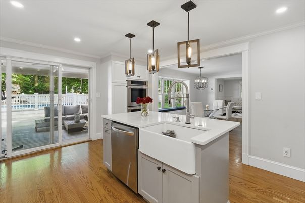 Dining room, Interior, Kitchen, Pendant Lights, Recessed Lighting, Stainless Steel Appliances, Wood Texture Flooring