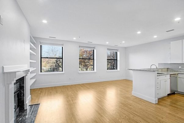 Empty room, Fireplace, Interior, Kitchen, Recessed Lighting, Wood Texture Flooring