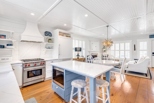 Dining room, Fireplace, Interior, Kitchen, Living room, Pendant Lights, Recessed Lighting, Stainless Steel Appliances, Wood Texture Flooring