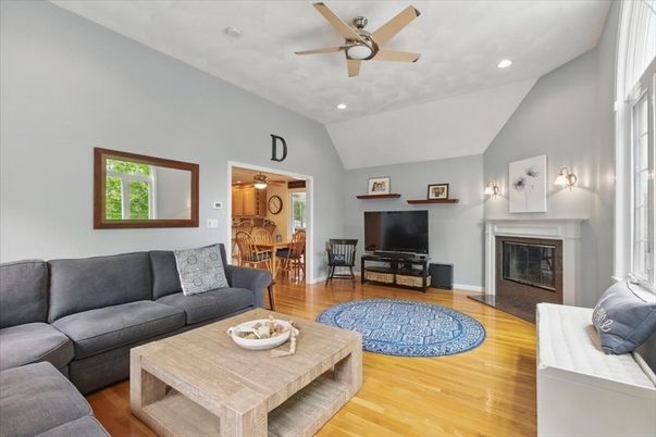 Dining room, Fireplace, Interior, Living room, Recessed Lighting, Wood Texture Flooring