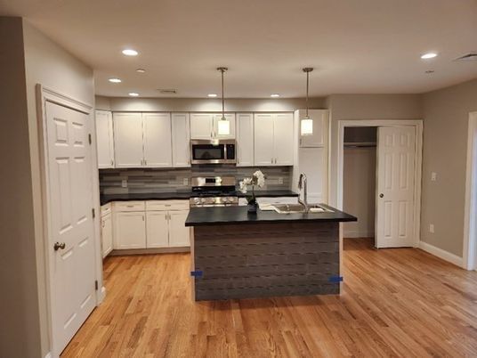 Interior, Kitchen, Pendant Lights, Recessed Lighting, Stainless Steel Appliances, Wood Texture Flooring